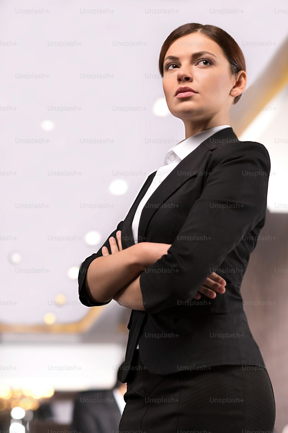 A Young Woman In Suit And Bra On Black Background Stock Photo, Picture and  Royalty Free Image. Image 16140007.