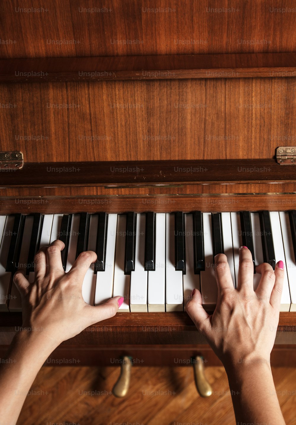 Close-up of a hands of piano player in motion