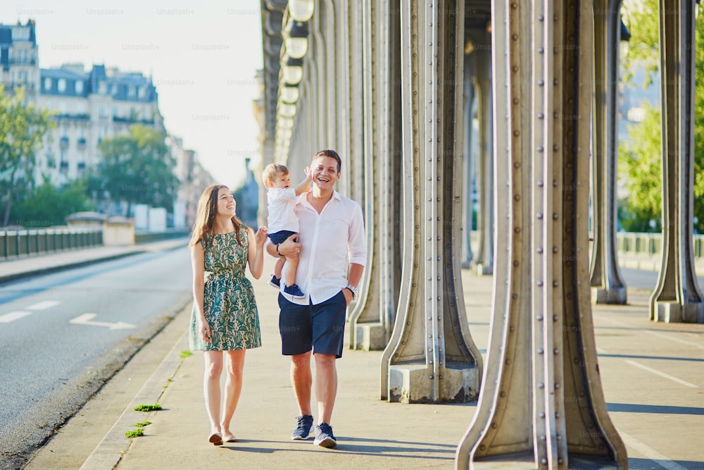 Happy family of three enjoying their vacation in Paris, France