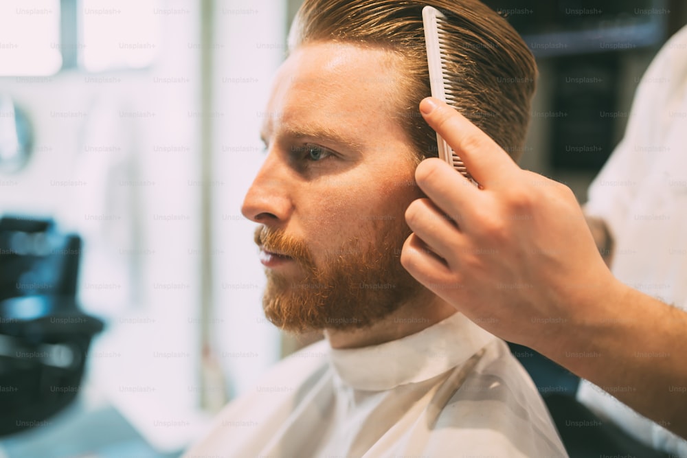 Hair mustache beard treatment in barber shop