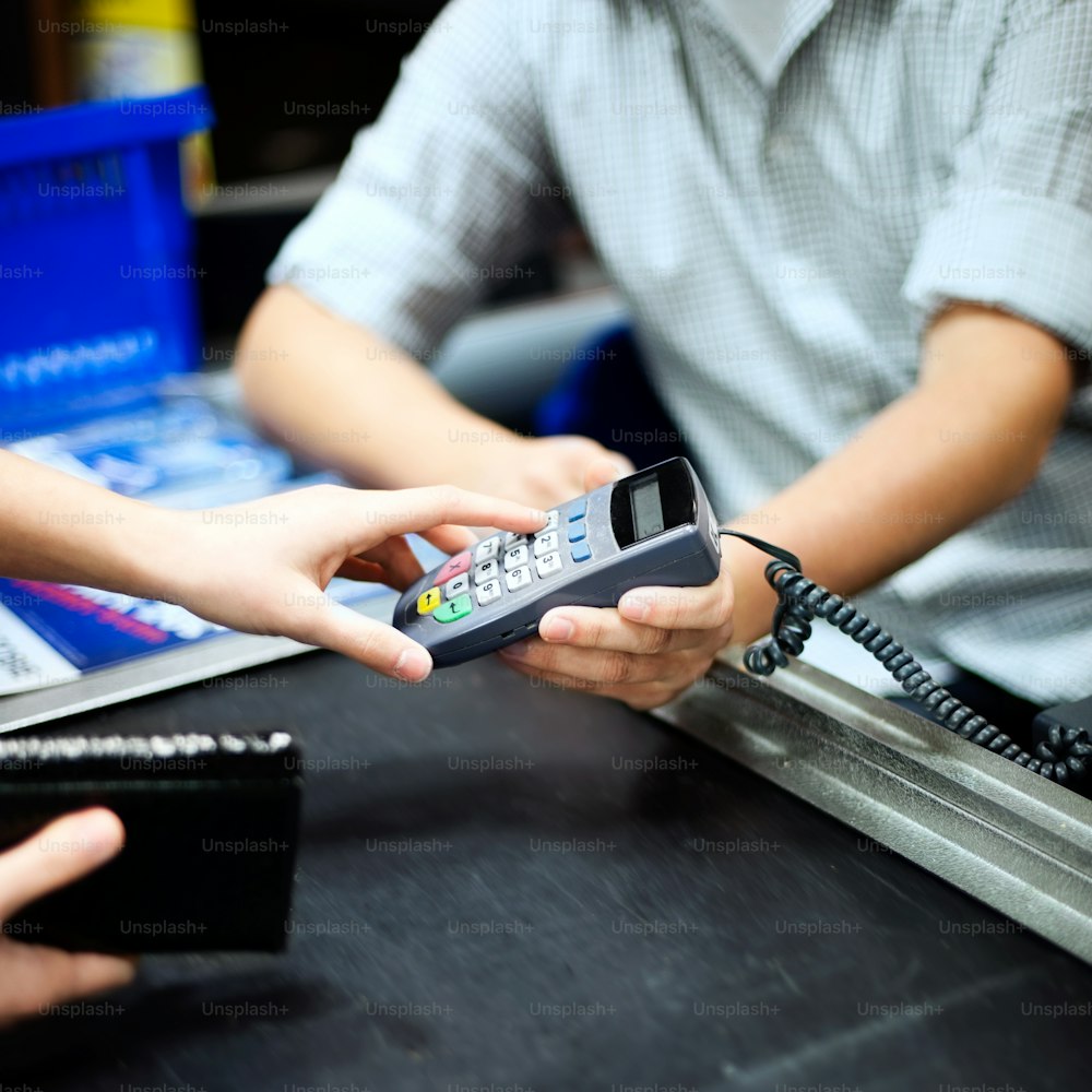 a person holding a phone in their hand