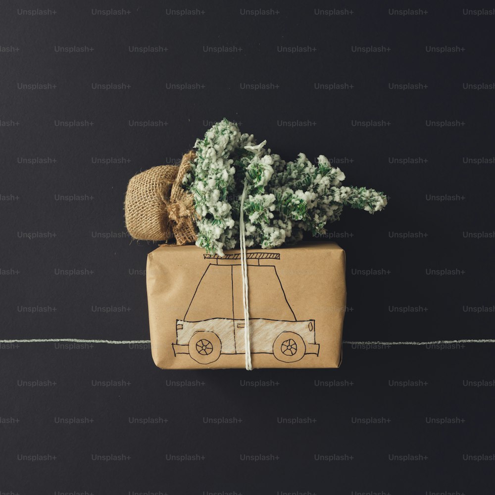 Gift box car drawing with chrismas tree. Flat lay. Christmas concept.