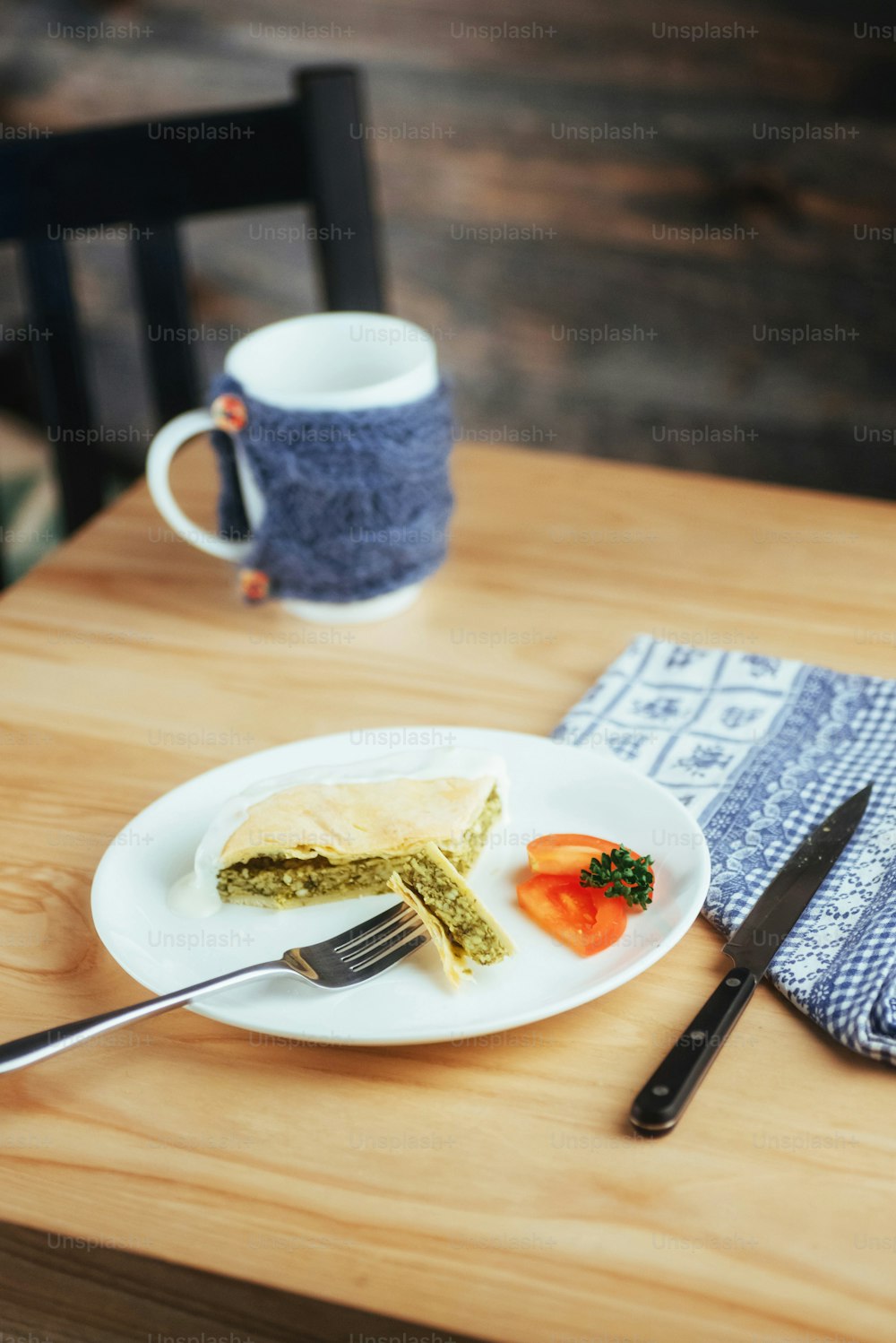 pie with spinach and tomato slice