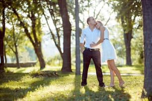 Romantic young couple stay together in park