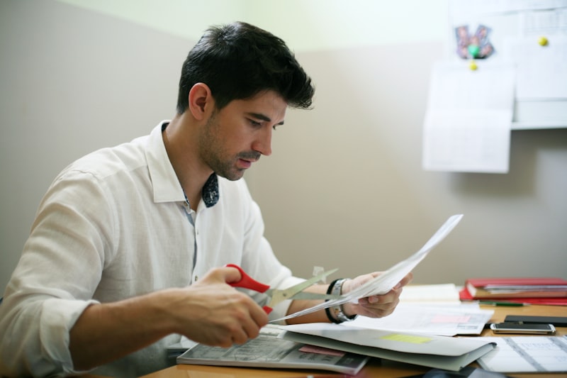 Person reviewing manuscript pages