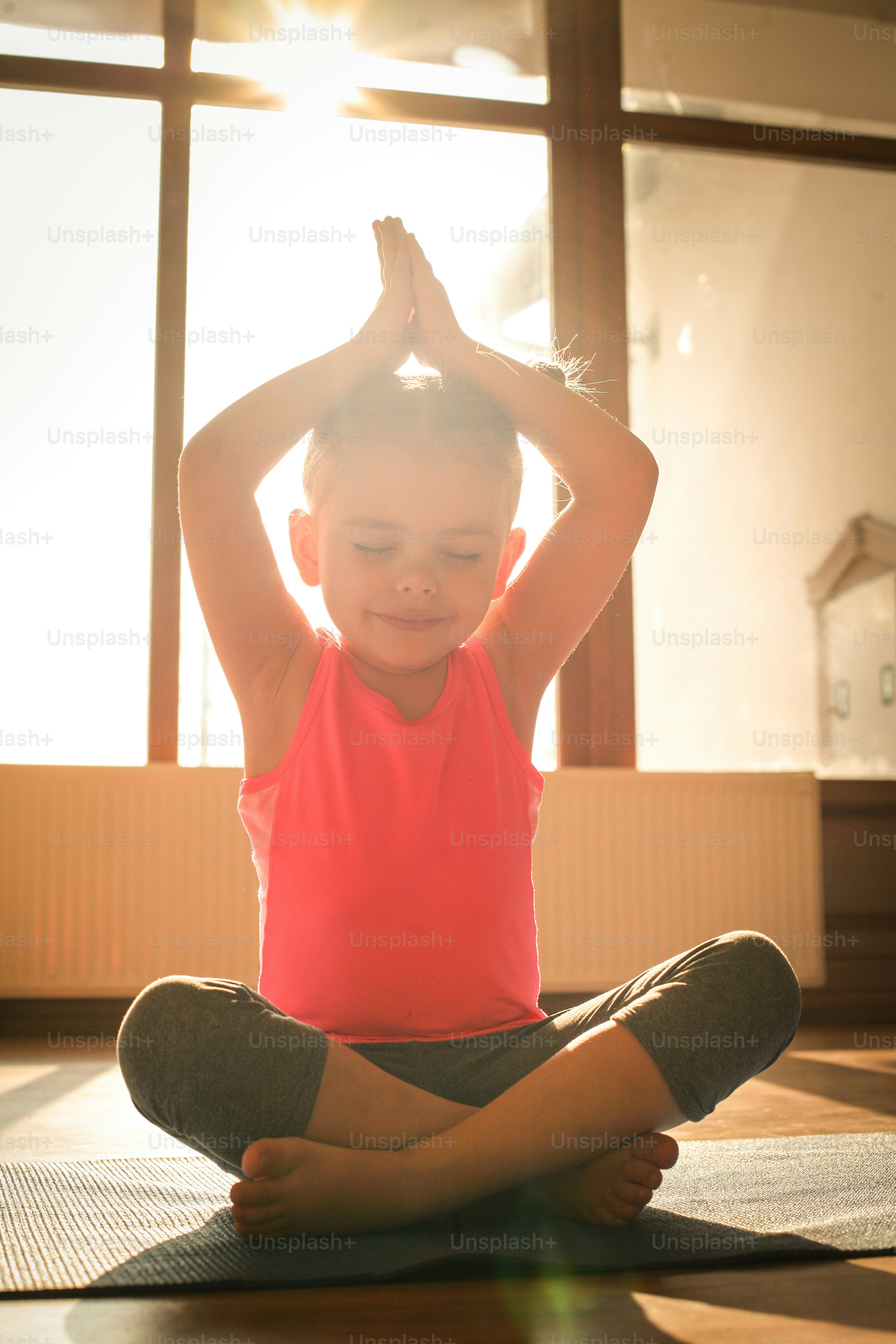Little girl workout at home.