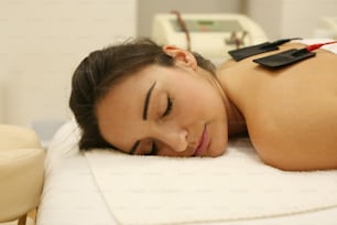 Brunette woman on physical therapy.