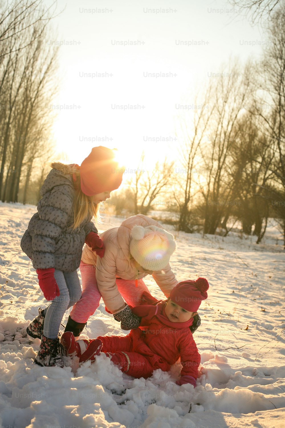 Children playing outdoor in the snow.