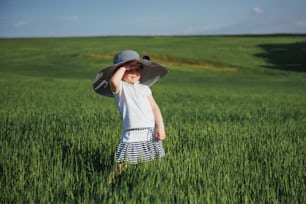 Child in a big hat. Carpathians Ukraine Europe