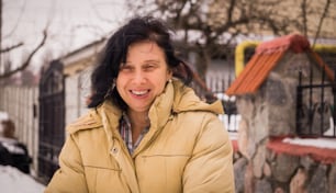 A laughing middle-aged Eastern European woman. Natural beauty