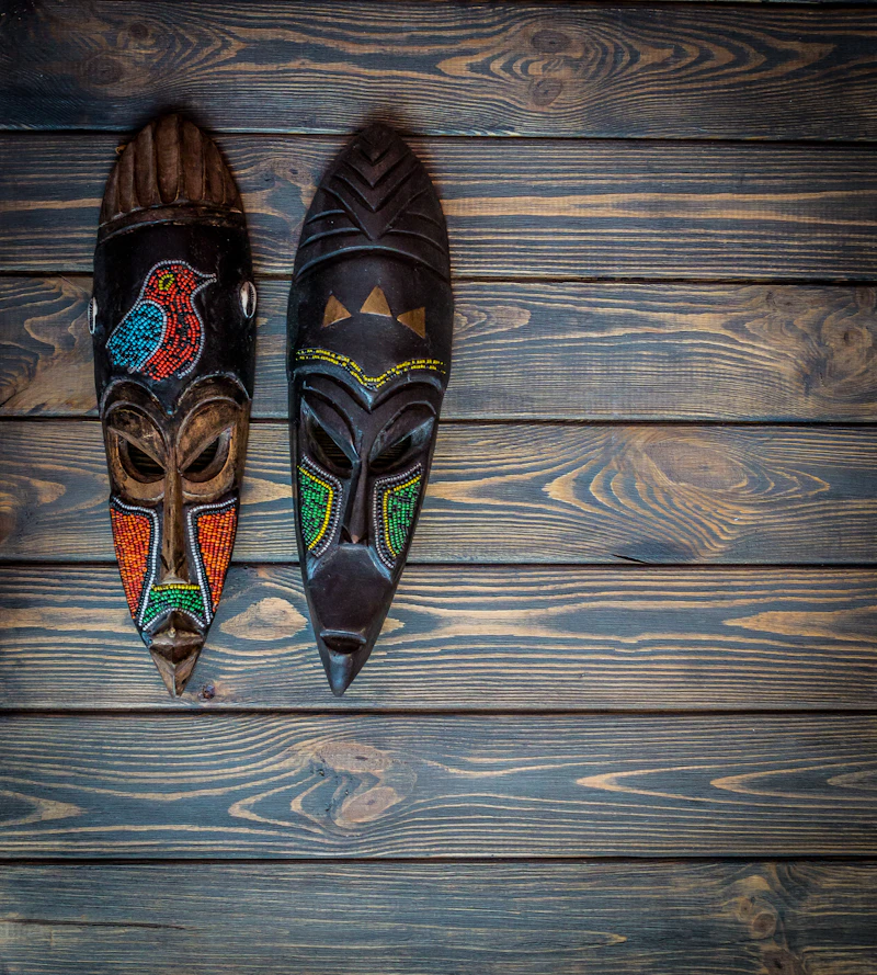 African ritual masks on gallery wall