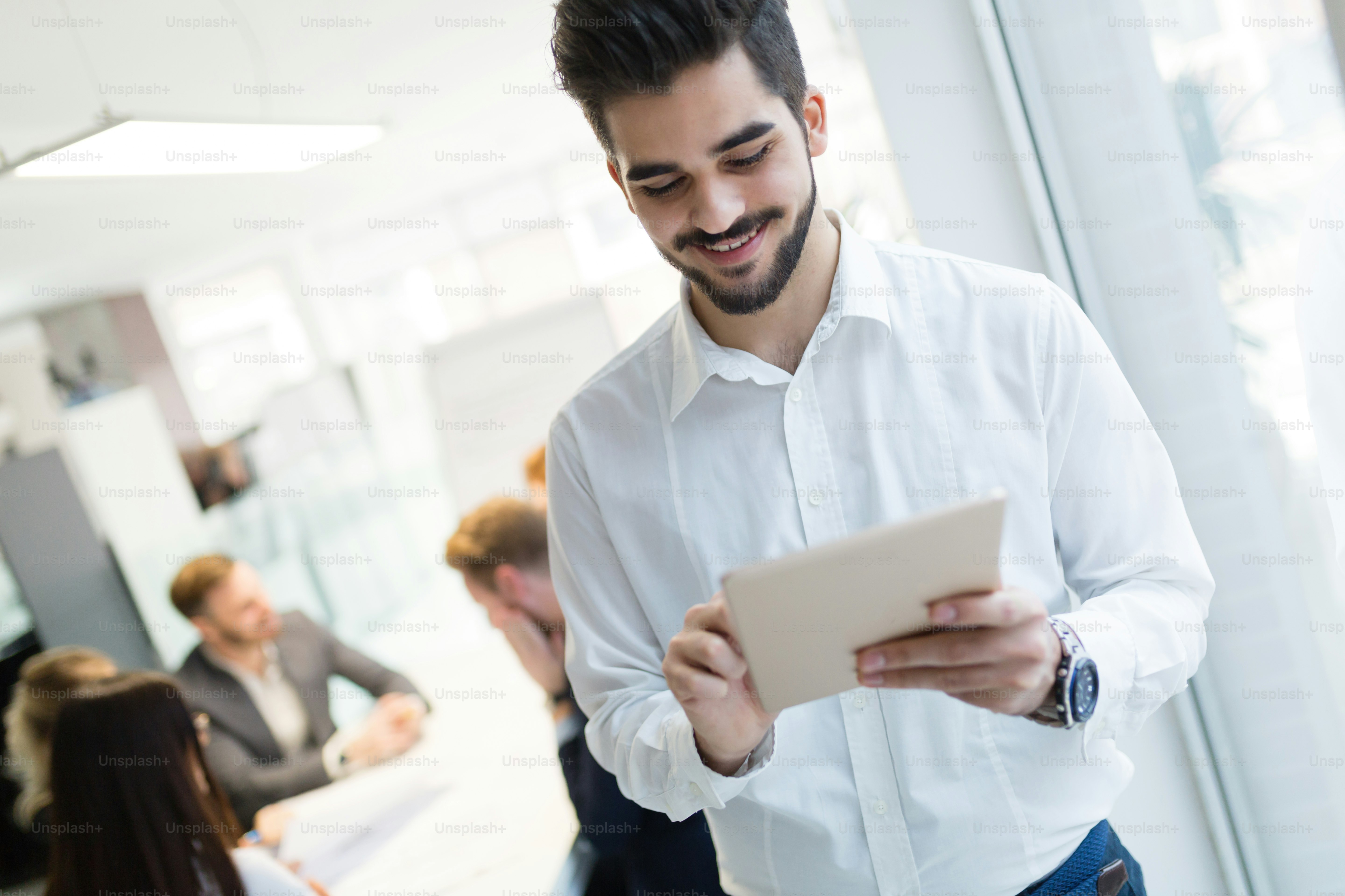 Successful happy worker in information technology industry working in ...