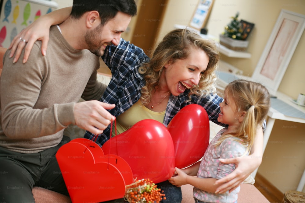 Smiling family celebrating mothers day.