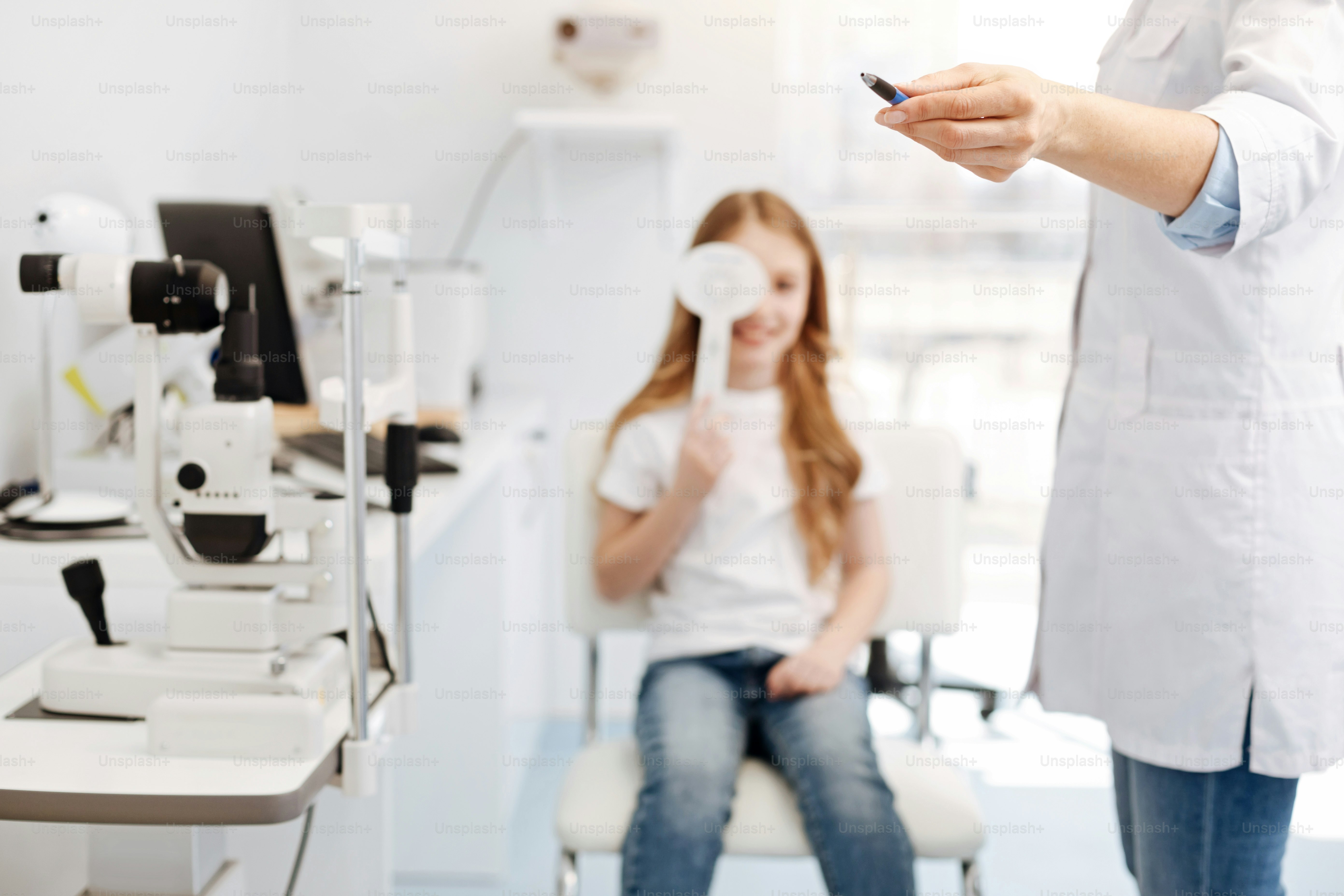 Scrupulous procedure. Handsome friendly skillful doctor being very ...