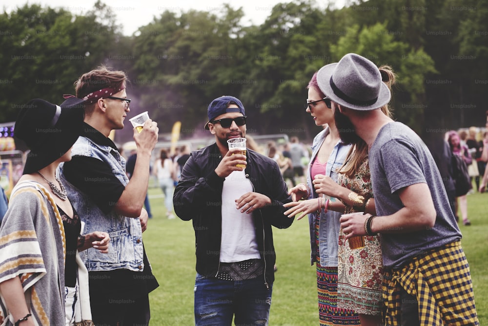 Group of friends spending time at the music festival