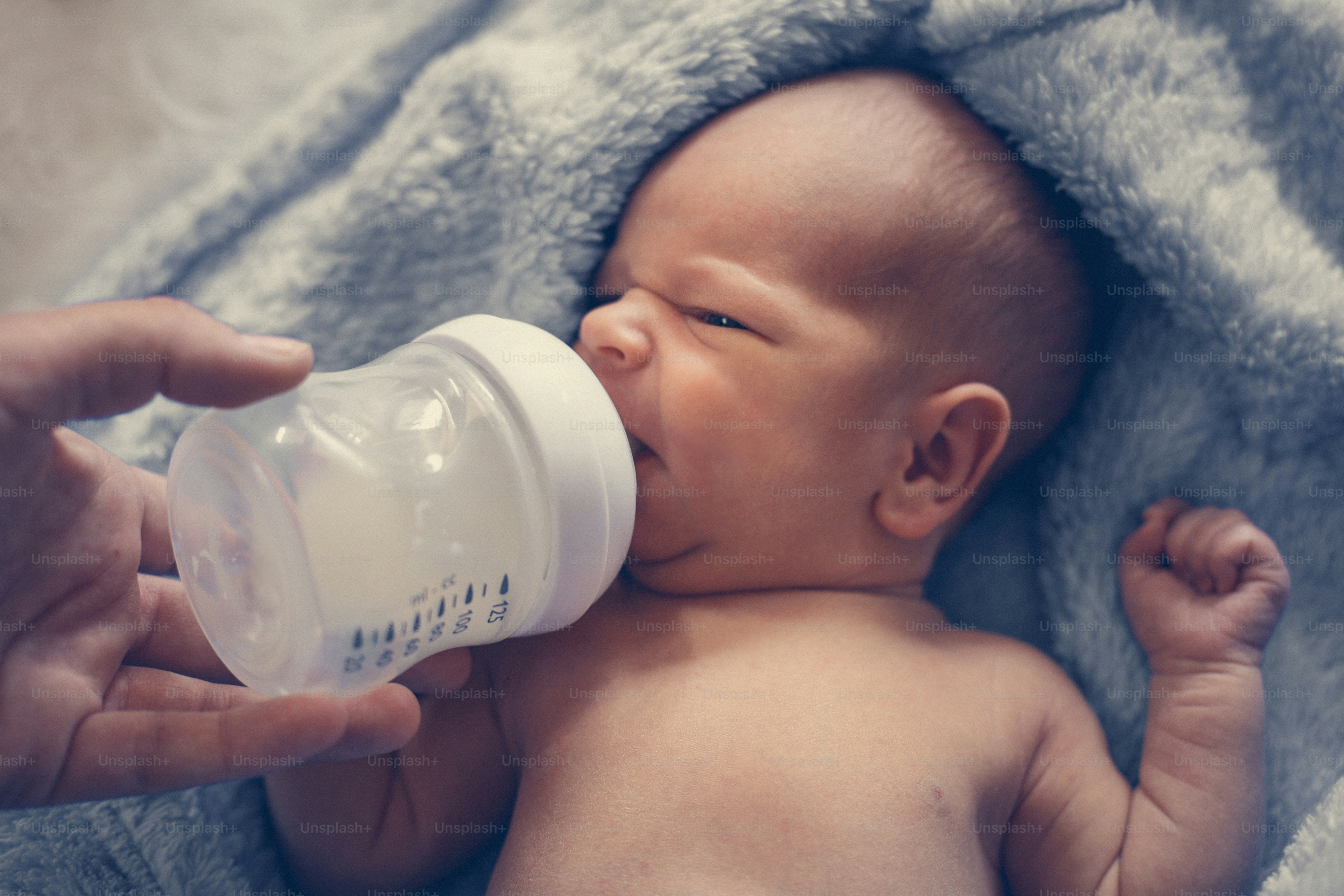 Mother Feeding One Weeks Old Newborn Baby Boy. Photo – Waking Up Image ...