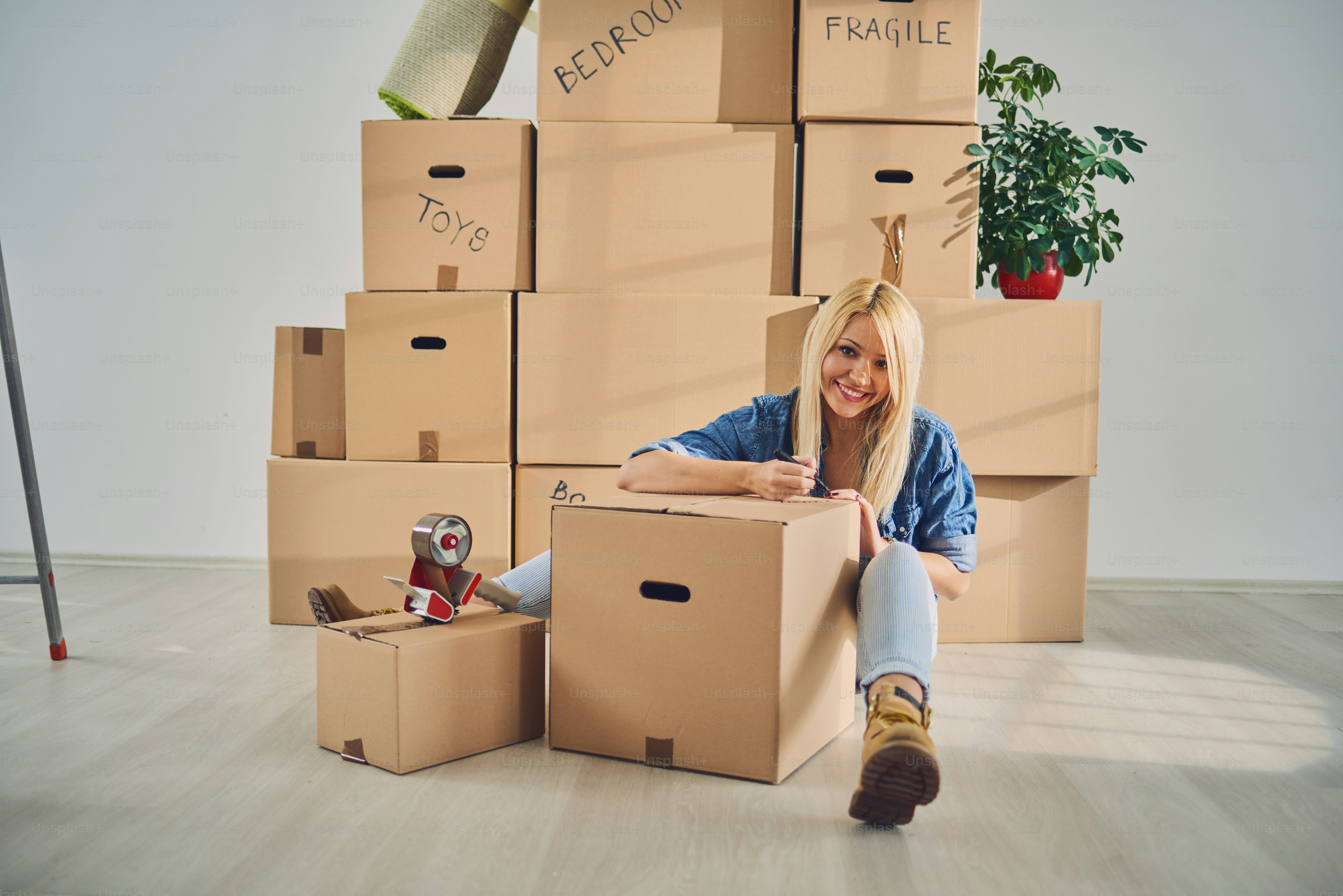 Taping and packing the boxes