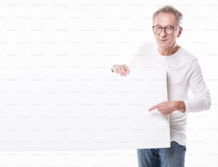 Senior handsome man Holding Together A Blank empty White Board .