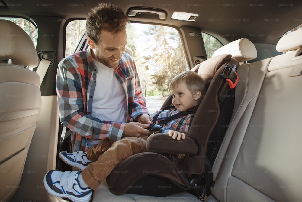 Travel by car family ride together child safety