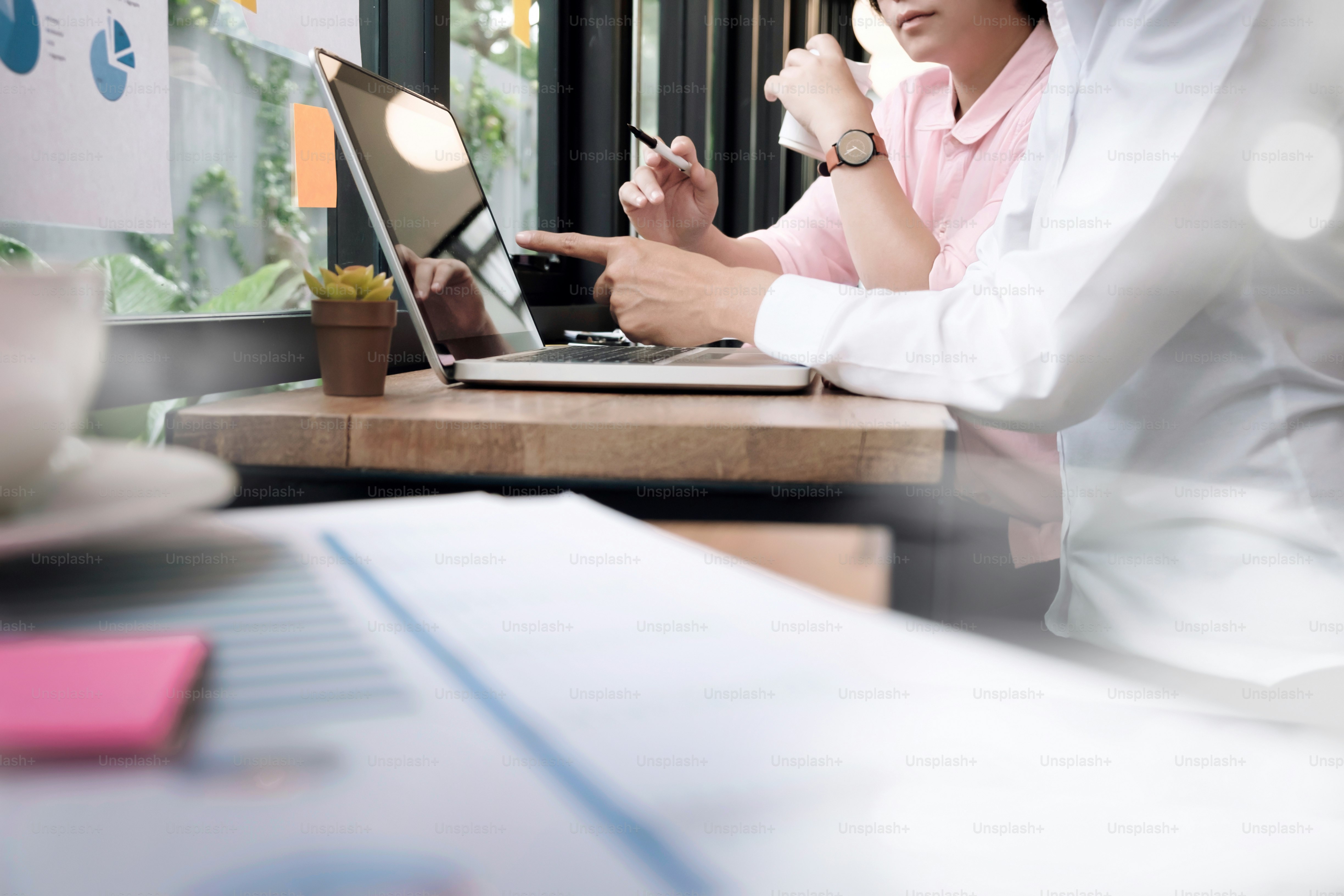 Young startups businessmen teamwork brainstorming meeting to discuss plan startup project