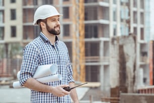 Male work building construction engineering occupation carry blueprint