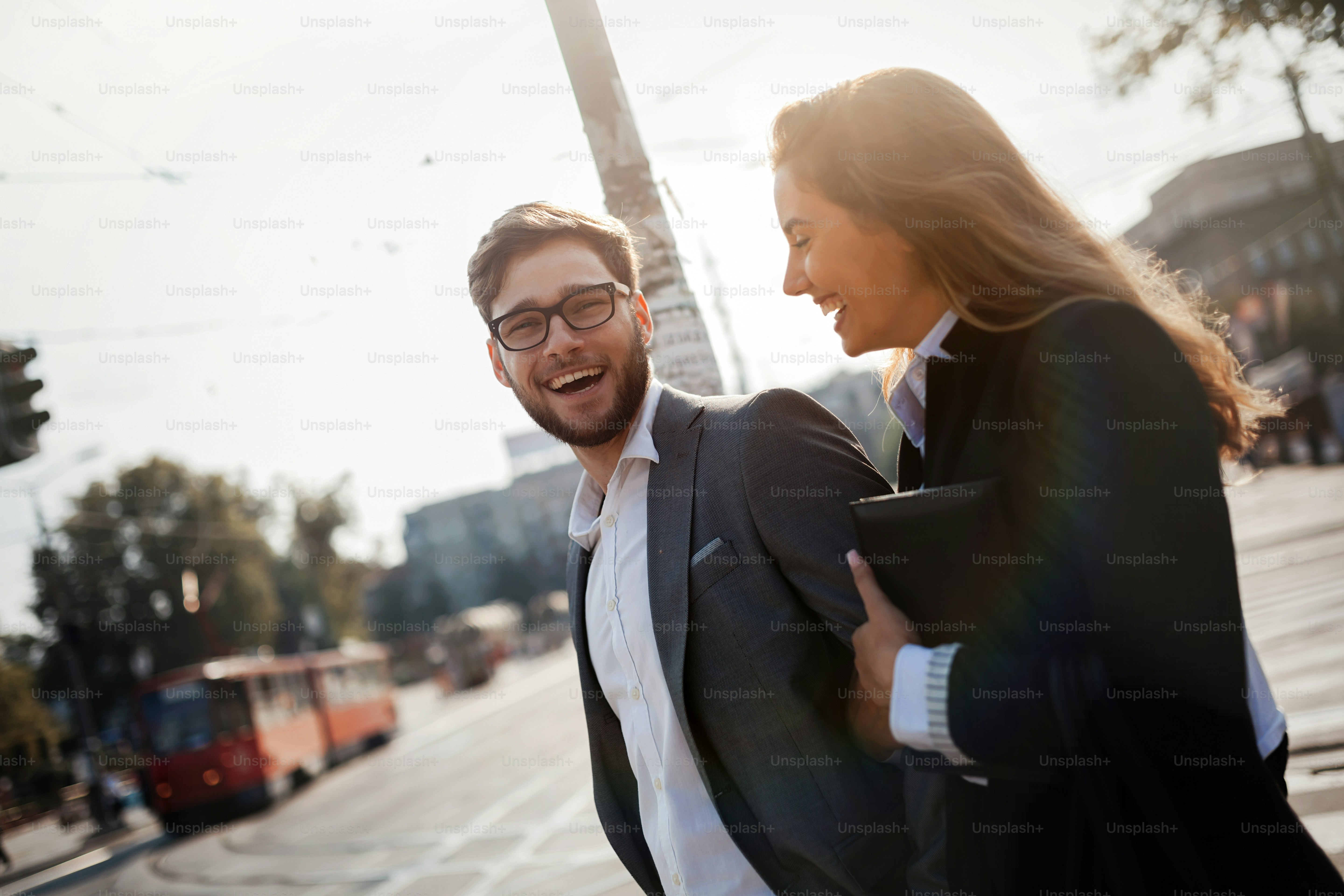 Happy business people walking in city and smiling photo – Street Image ...