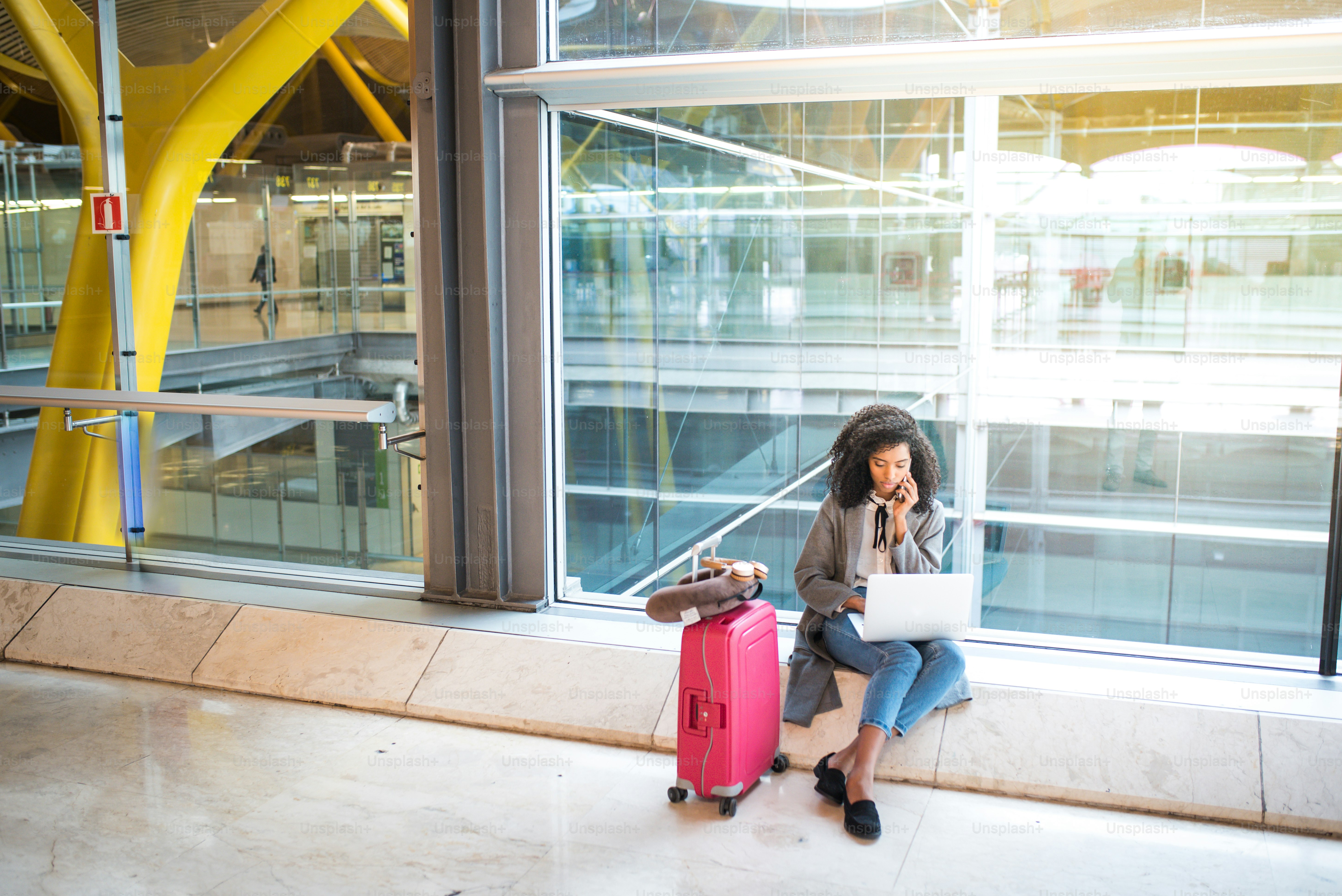 Traveler comparing mileage booking platforms before booking reward flights