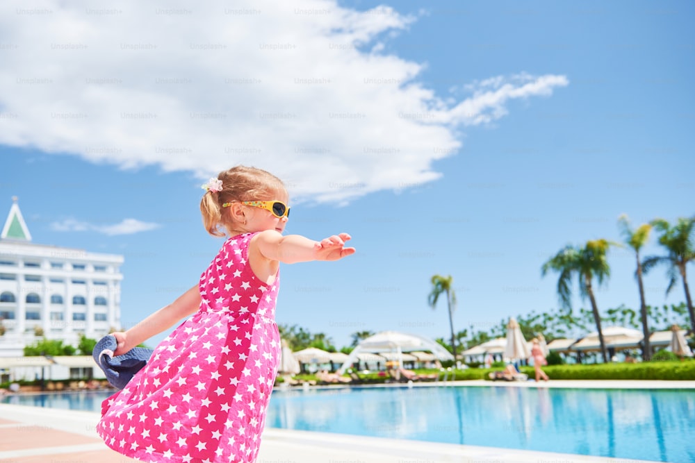 Portrait of a happy girl outdoors in summer day. Amara Dolce Vita Luxury Hotel. Resort. Tekirova-Kemer. Turkey
