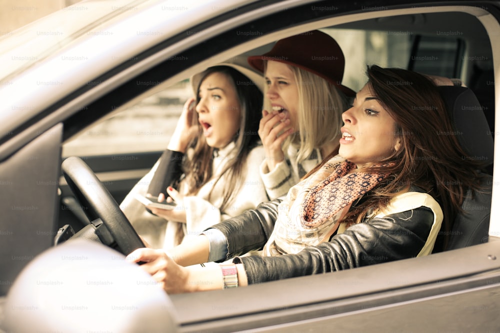 Three girls tried to avoid the car accident."n