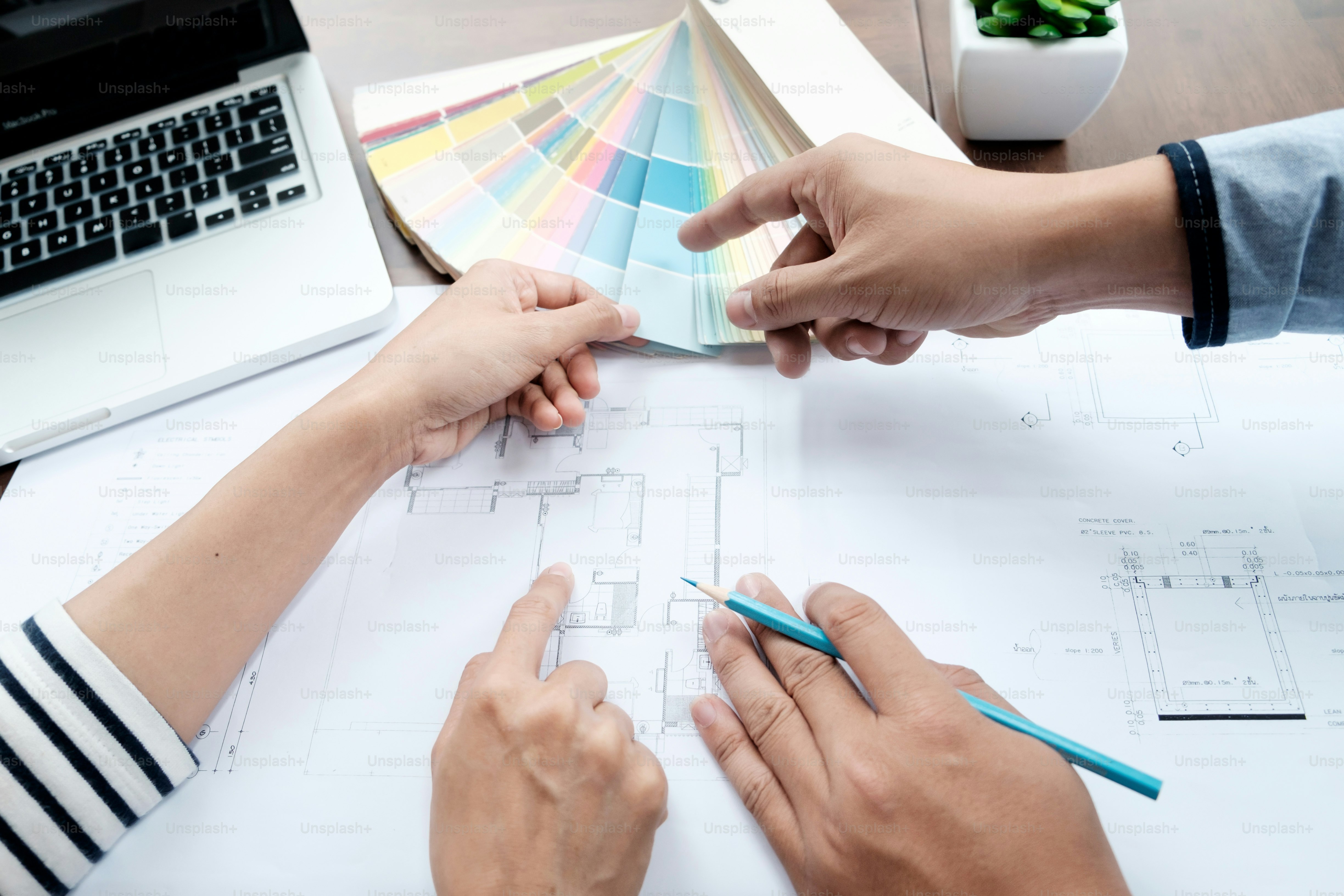 Architectural and Interior designer and Engineer team to meeting and select color for house project.