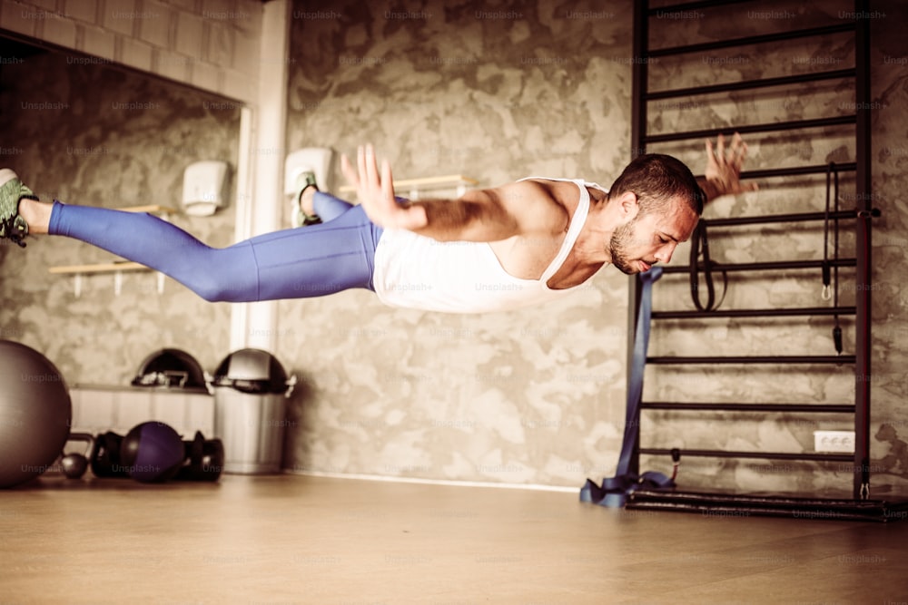 Athlete levitates above ground during training.