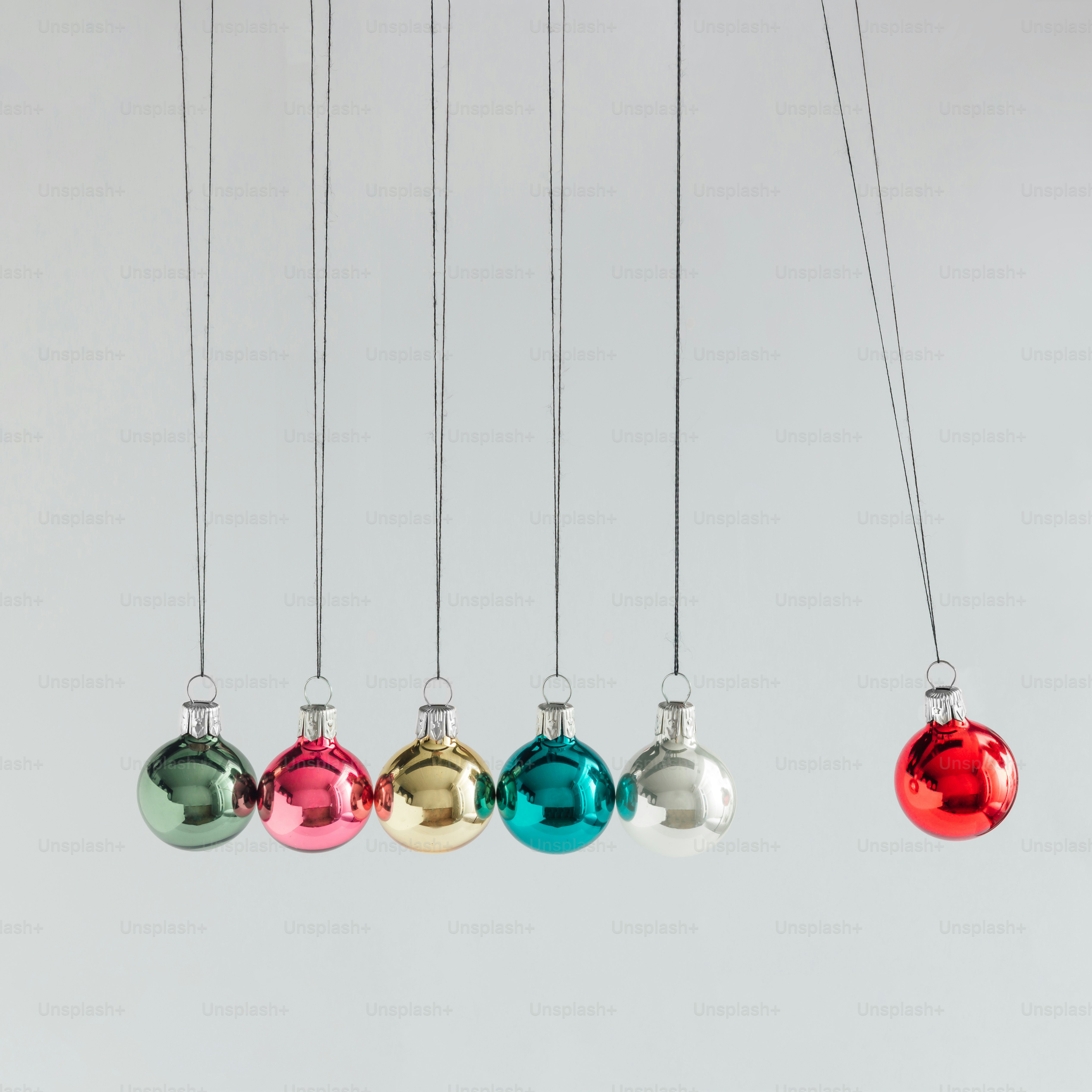 Creative concept. Colorful Christmas baubles decoration. New year minimalism.