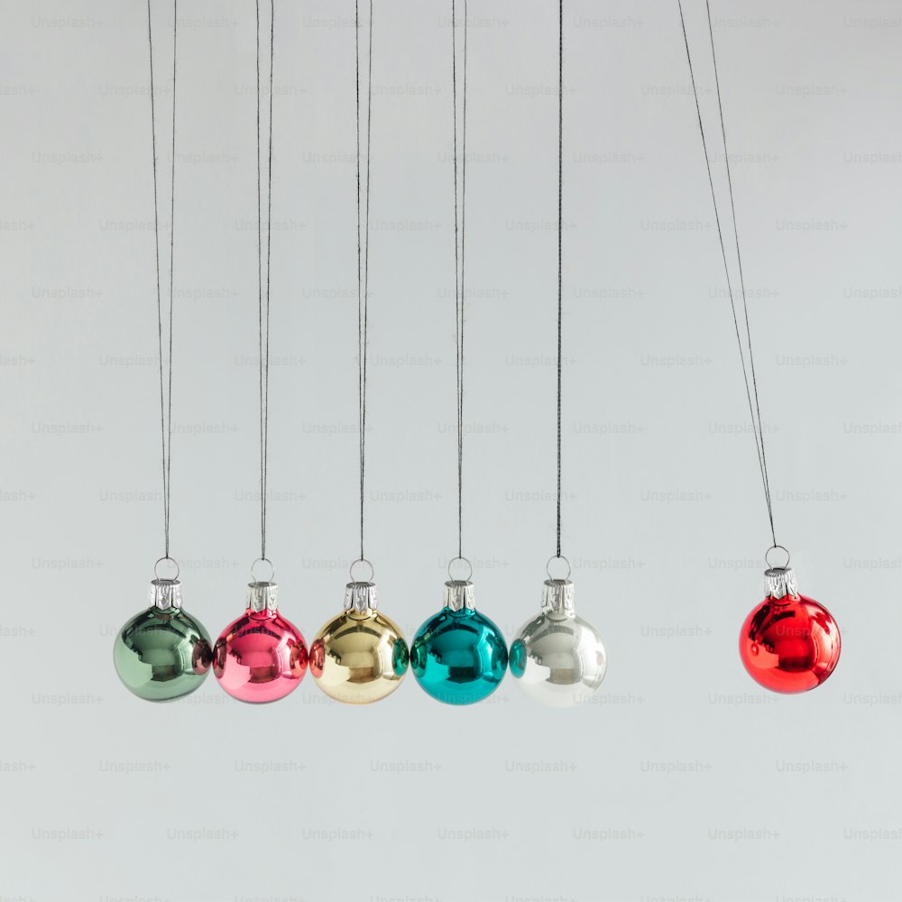 Creative concept. Colorful Christmas baubles decoration. New year minimalism.