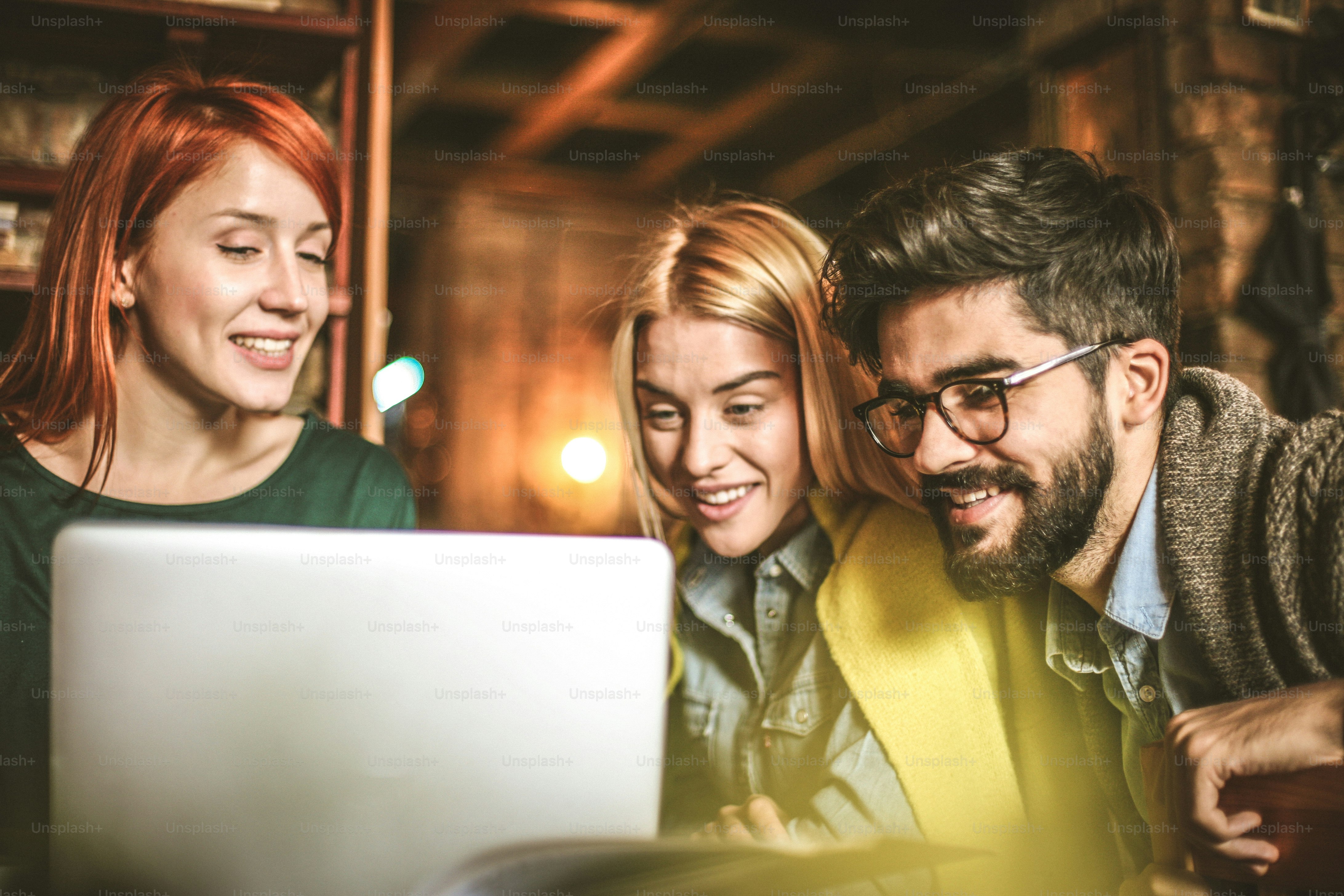 Young student girl helping  friends.