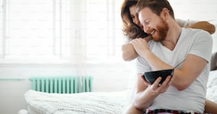 Romantic loving couple in morning in bed