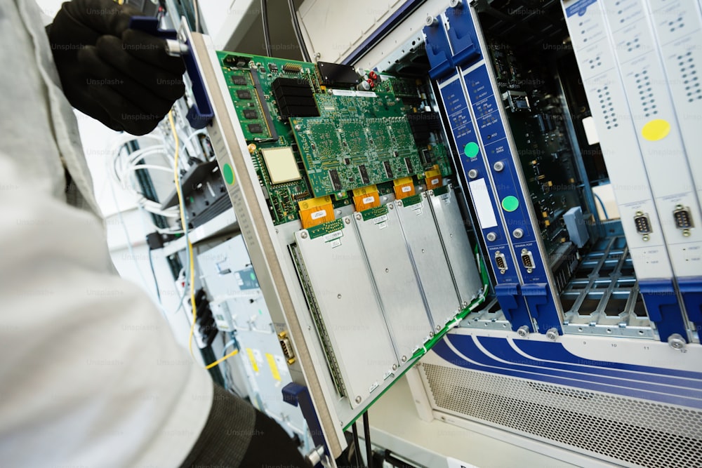 Picture of technician engineer repairing cmts networking cards