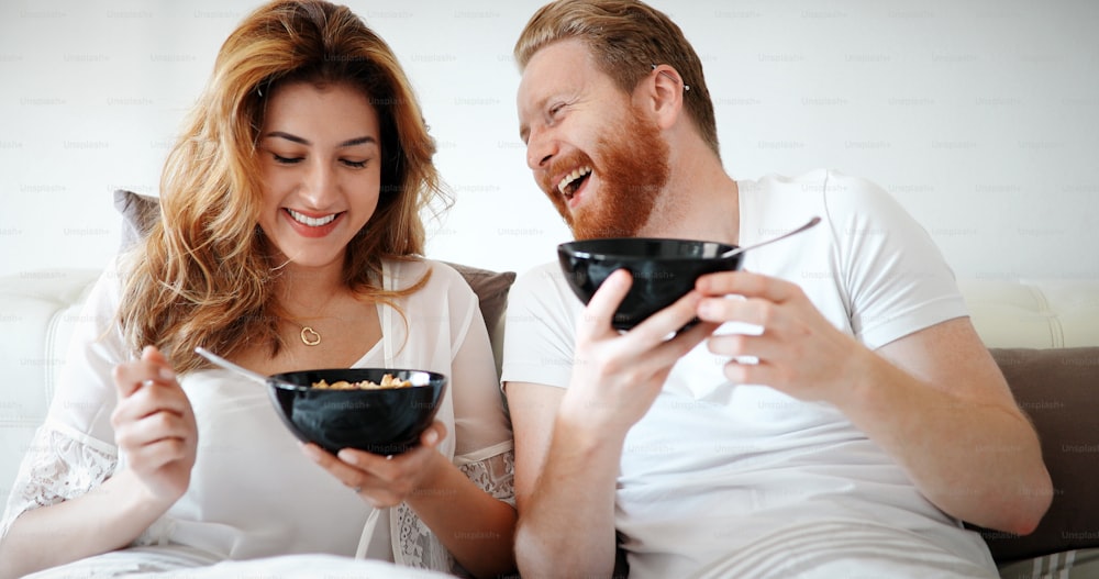 Romantic loving couple in morning in bed