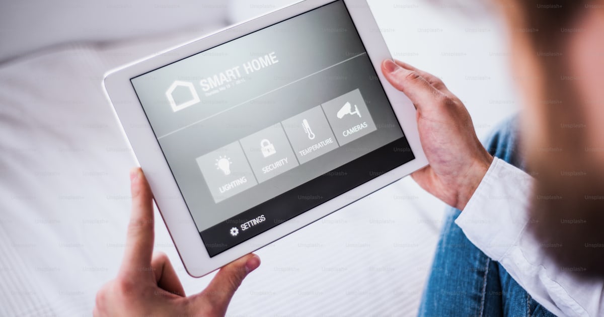 A tablet with smart home control system.A tablet with smart home ...