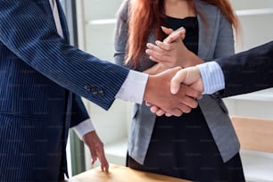 Business handshake. Business executives to congratulate the joint