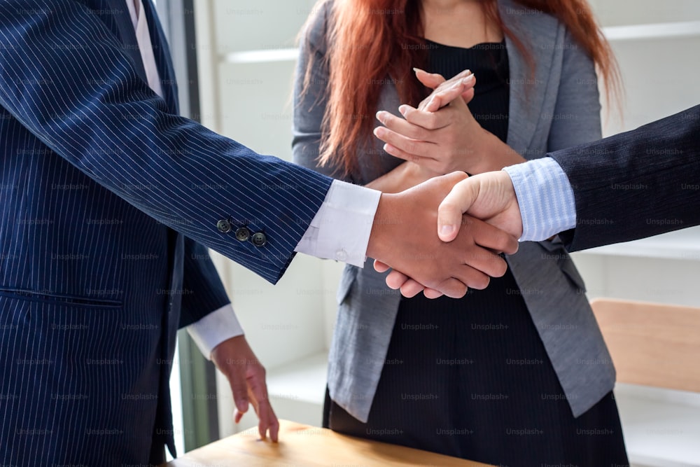 Business handshake. Business executives to congratulate the joint