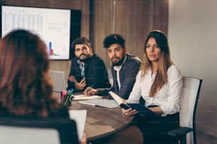 Group of business people on a meeting in a conference room