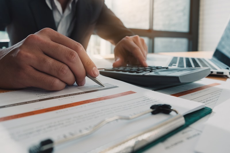 stock market trading floor, financial charts declining, Middle East conflict imagery