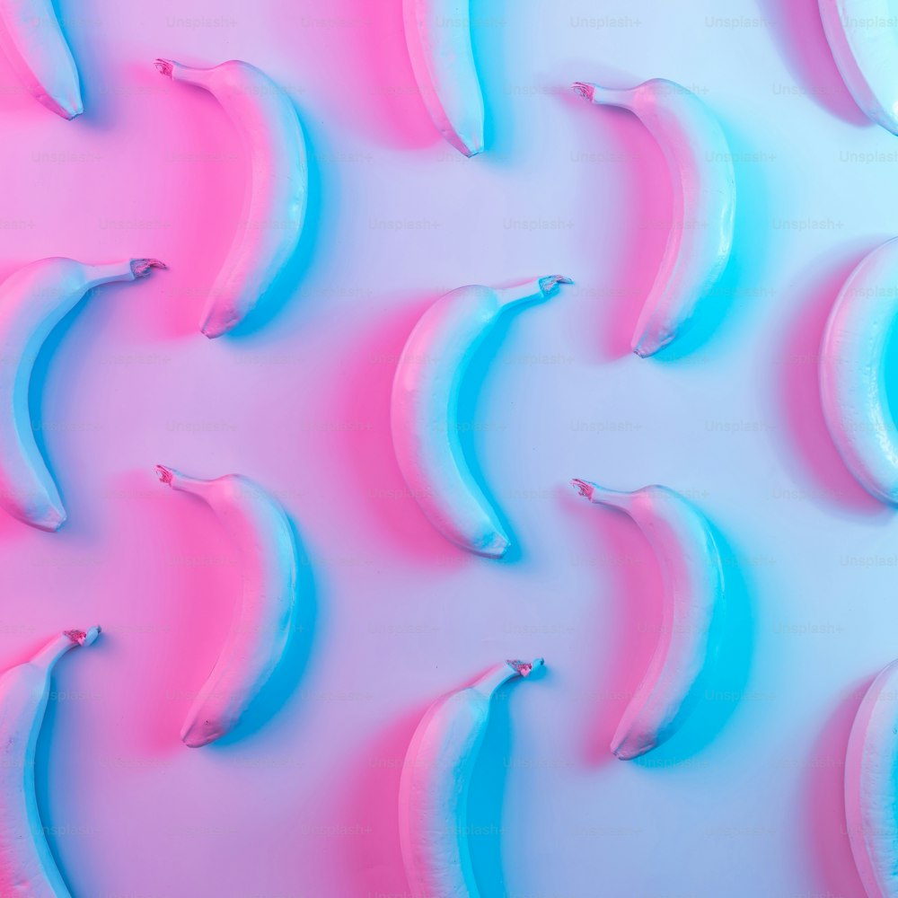 Banana pattern in vibrant bold gradient holographic neon  colors. Concept art. Minimal surrealism background.