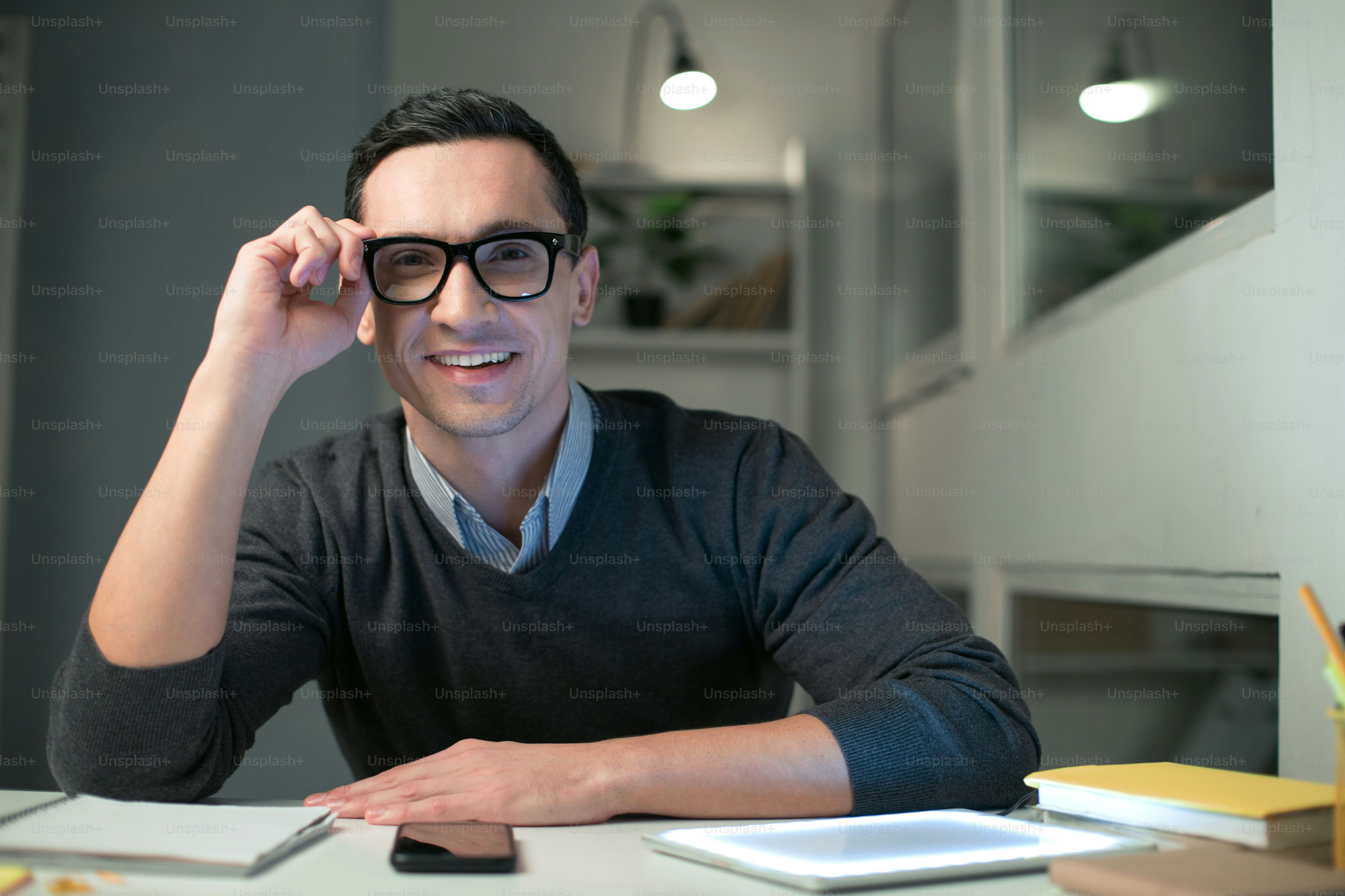 Comparing sleep friendly blue light glasses with different lens tints on a work desk
