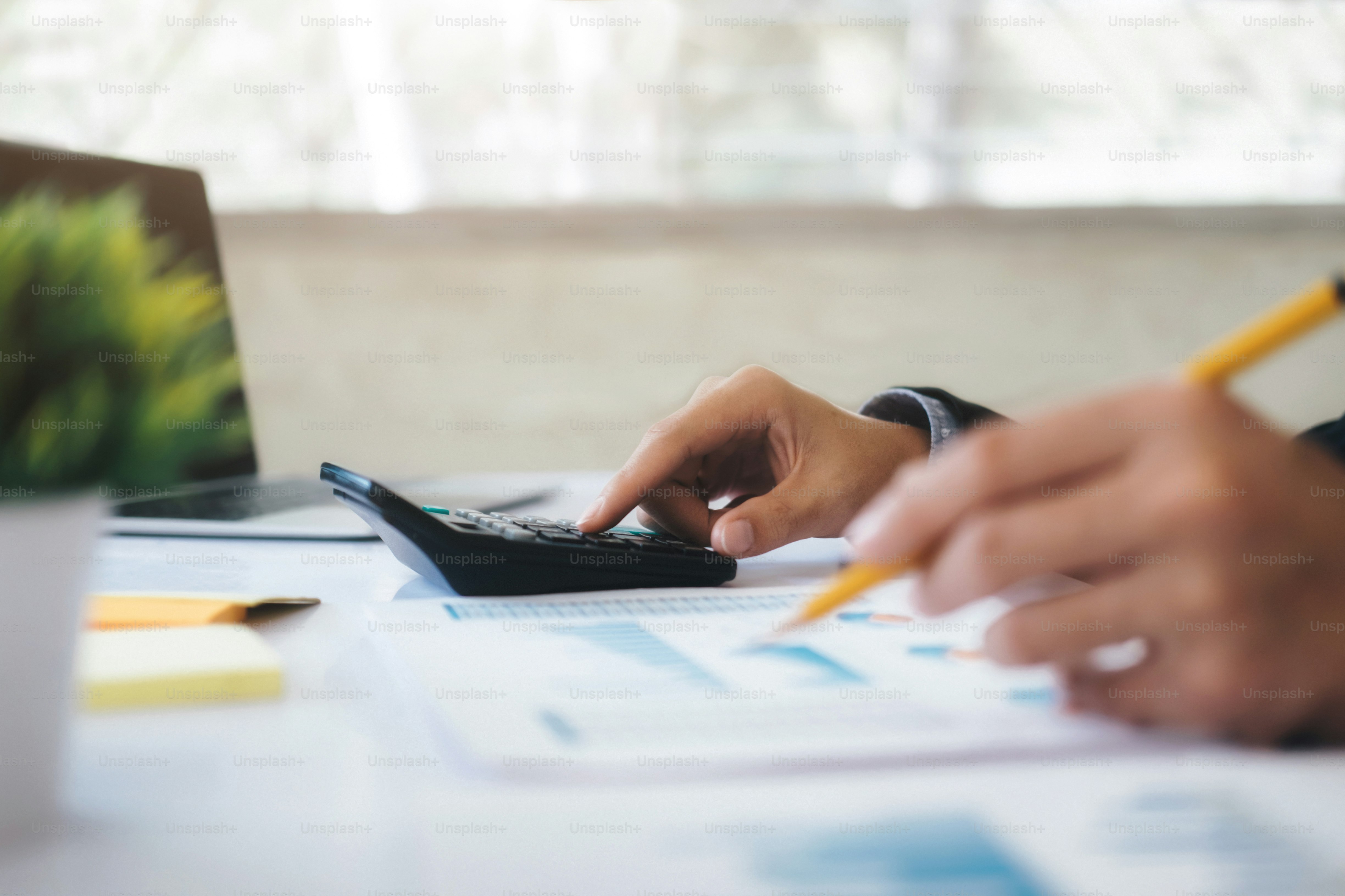 Finances Saving Economy concept. Businessman use calculator.