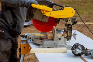 Circular Saw. Carpenter Using Circular Saw for wood wood cuts circular saw