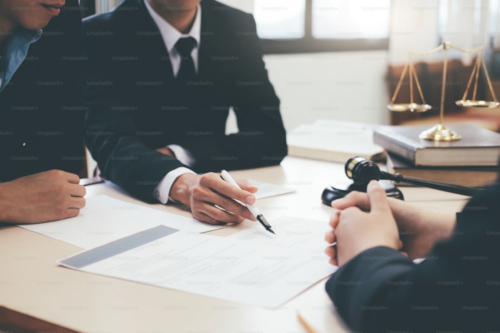 Law, advice and Legal services concept. Lawyer and attorney having team meeting at law firm. photo – Document Image on Unsplash