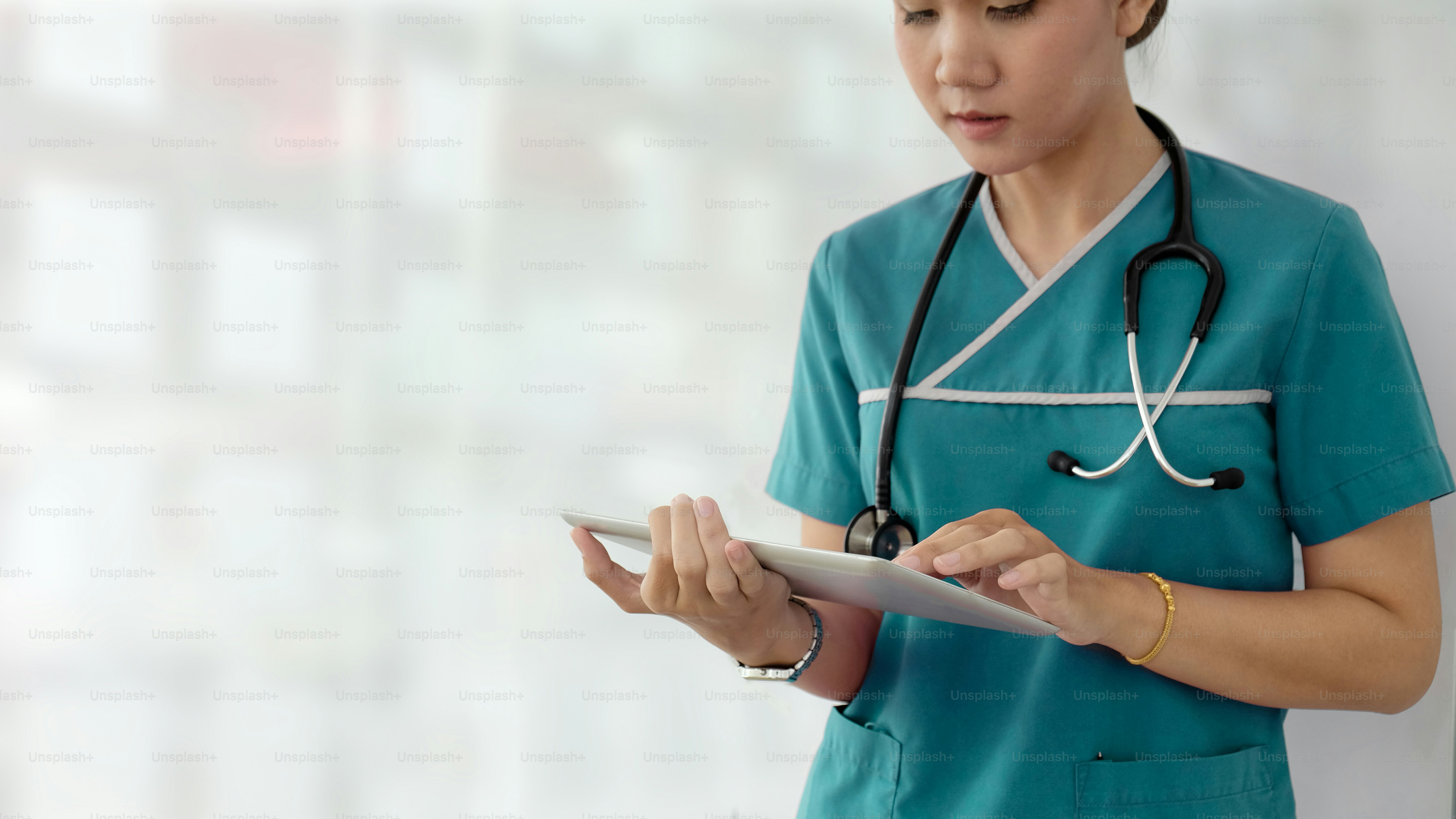 Doctor with digital tablet.