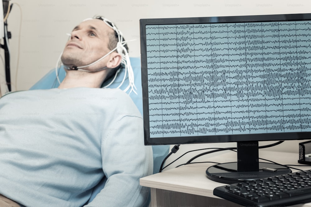 Electrical brain activity. Selective focus of a computer monitor with