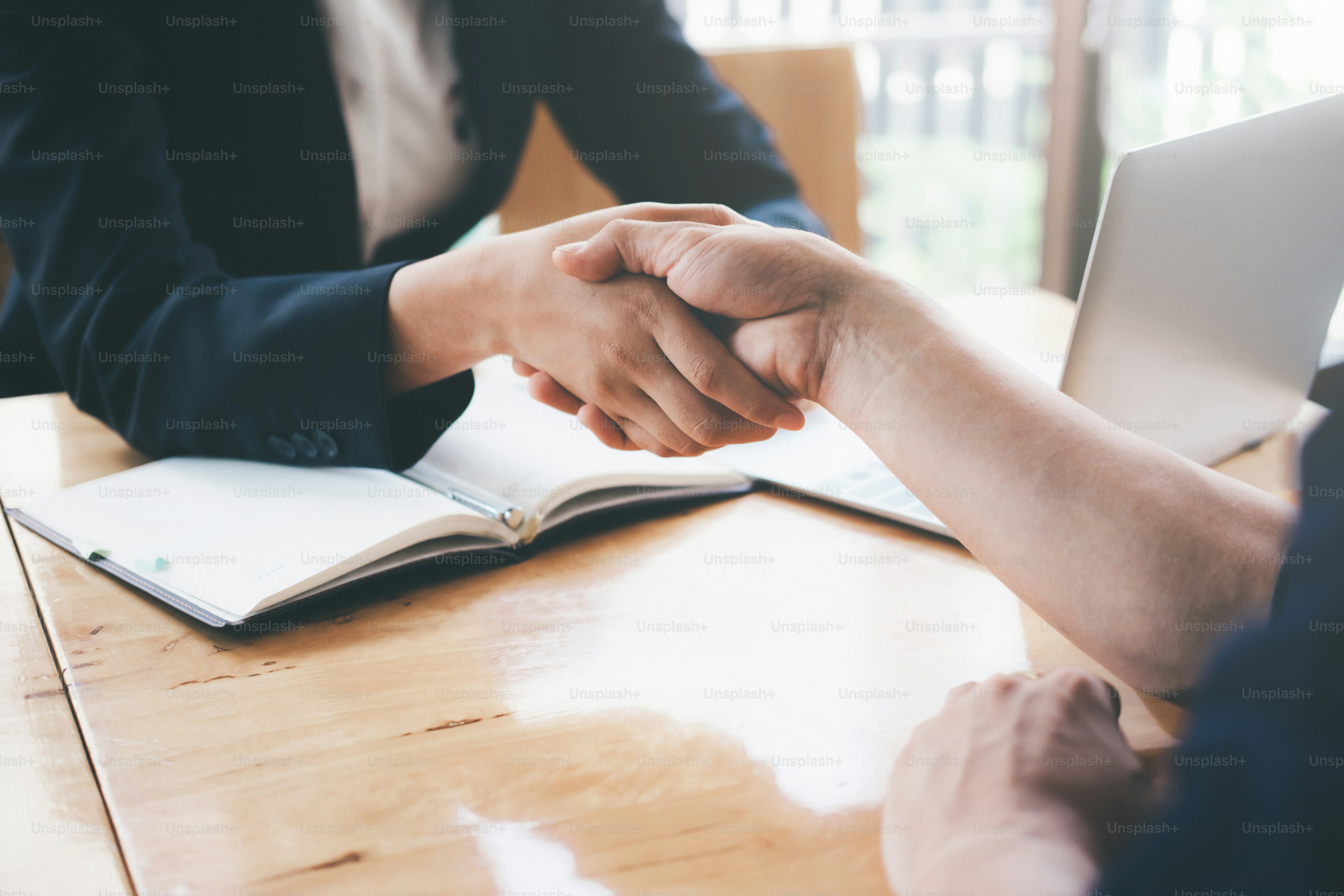 Business partnership meeting concept. Image businessmans handshake. Successful businessmen handshaking after good deal.